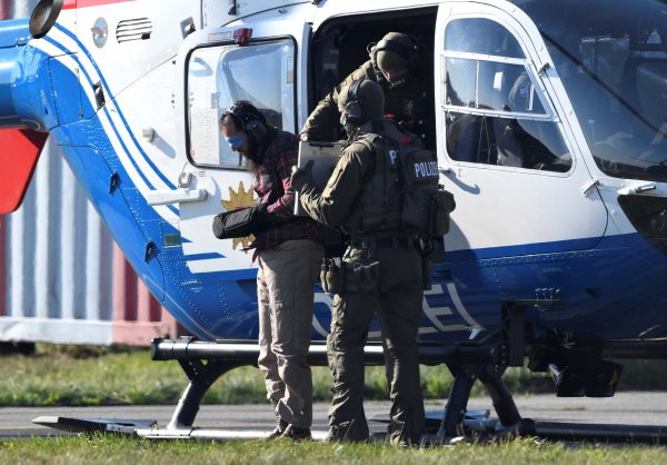 Moroccan Mounir el-Motassadeq is escorted at Hamburg airport