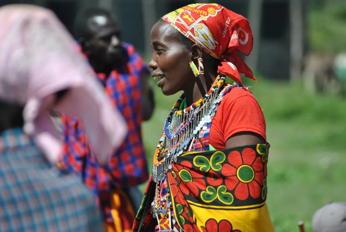 Nariku Kuyo converses with her friends at the Naikarra market in Narok County, Kenya, on May 4, 2018. (Dominic Kirui/Special to The Epoch Times)