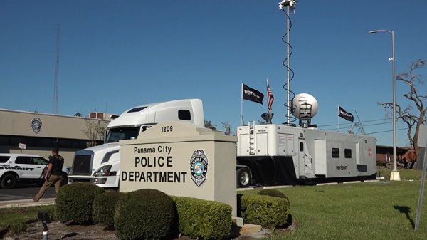 Verizon mobile truck in front of the Panama City Police Department