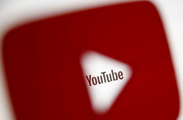 A 3D-printed YouTube icon is seen in front of a displayed YouTube logo in this illustration taken Oct. 25, 2017. (Dado Ruvic/Illustration/Reuters)