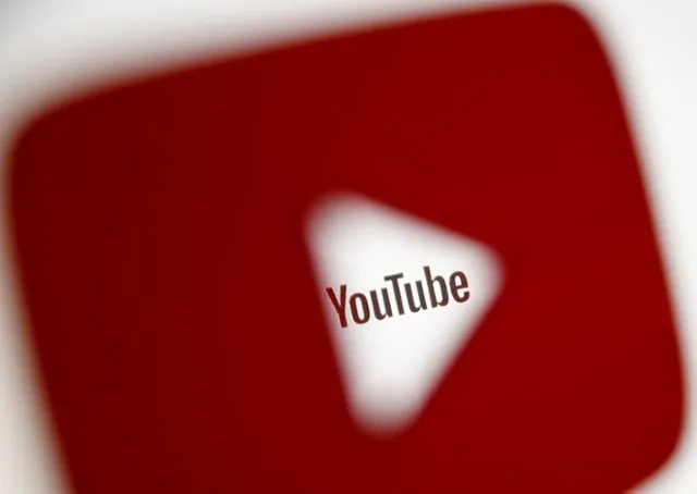 A 3D-printed YouTube icon is seen in front of a displayed YouTube logo in this illustration taken Oct. 25, 2017. (Dado Ruvic/Illustration/Reuters)