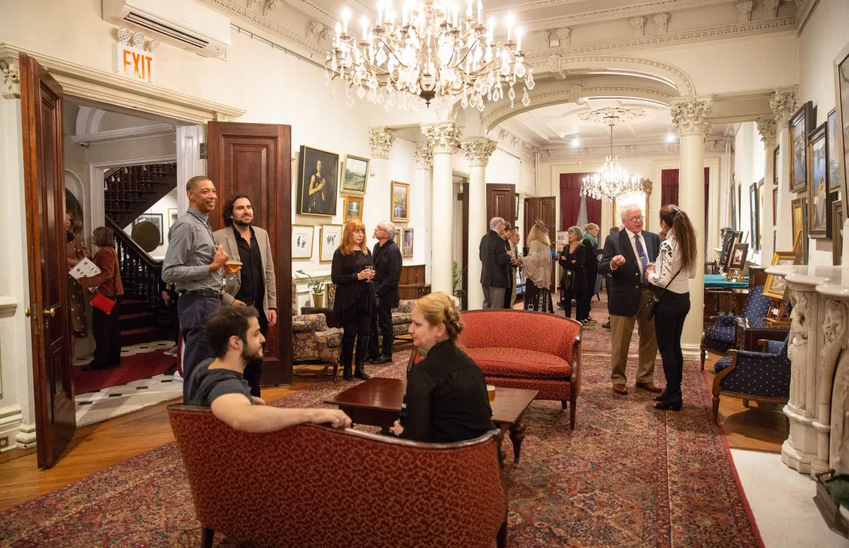 The "Collectors and VIP Reception with Exhibiting Artists" at the 10th American Masters Exhibition and Sale at the Salmagundi Club in New York on Oct. 11, 2018. (Milene Fernandez/The Epoch Times)
