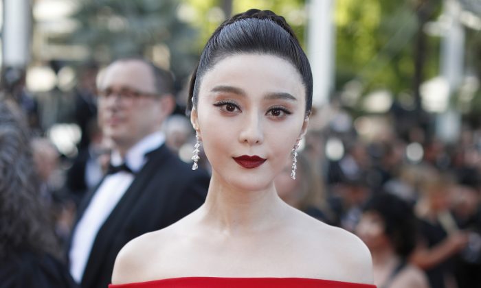 Fan Bingbing poses for photographers upon arrival at the screening of the film The Beguiled at the 70th international film festival, Cannes, southern France on May 24, 2017. (Thibault Camus/AP)