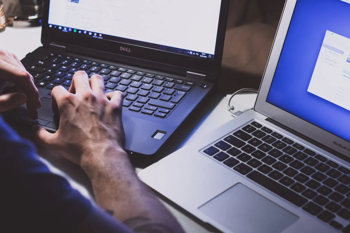 A man working on a laptop. (Unsplash) 
