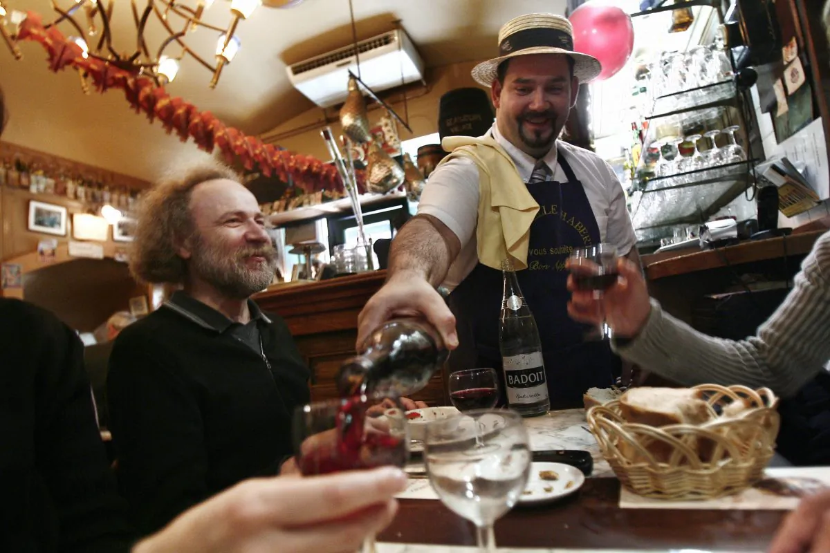 Restaurant patrons enjoy the Beaujolais Nouveau wine in a restaurant in Lyon, France, in this file photo. (Fred Dufour/AFP/Getty Images)