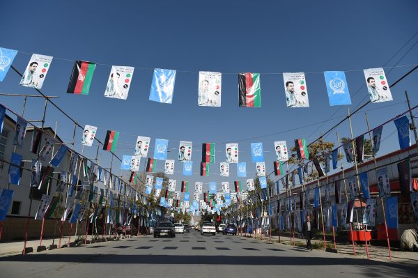 Afghan commuters posters parliamentary election