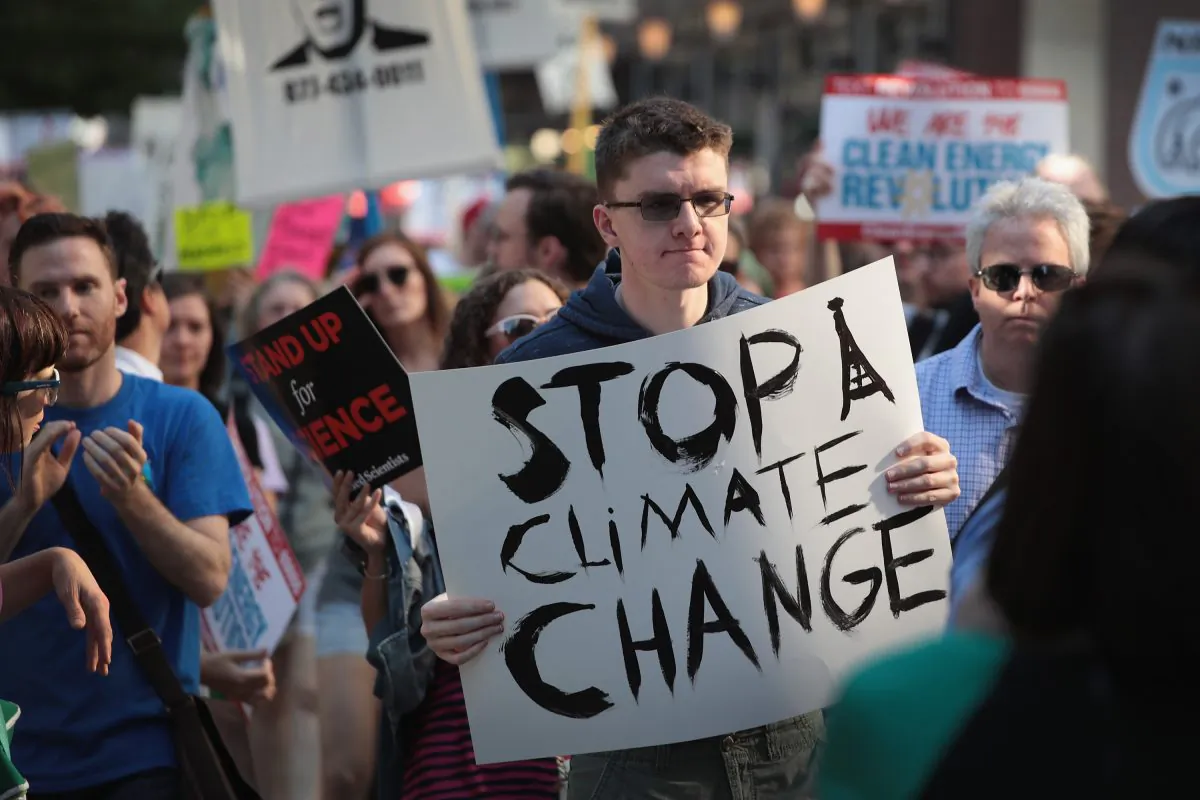 Demonstrators protest President Donald Trump's decision to exit the Paris climate change accord on June 2, 2017 in Chicago, Illinois. (Scott Olson/Getty Images)
