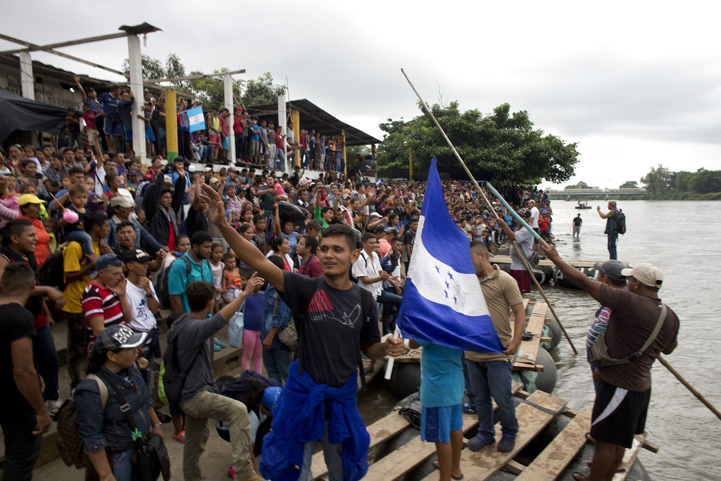 migrant caravan prepares to cross into mexico