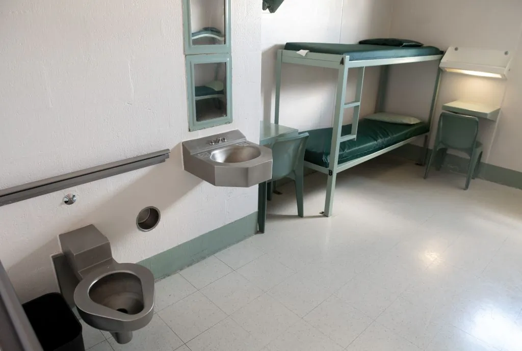A bunk bed, desks, toilet and sink inside a cell are seen at the Caroline Detention Facility in Bowling Green, Virginia, on August 13, 2018. (Saul Loeb/AFP/Getty Images)