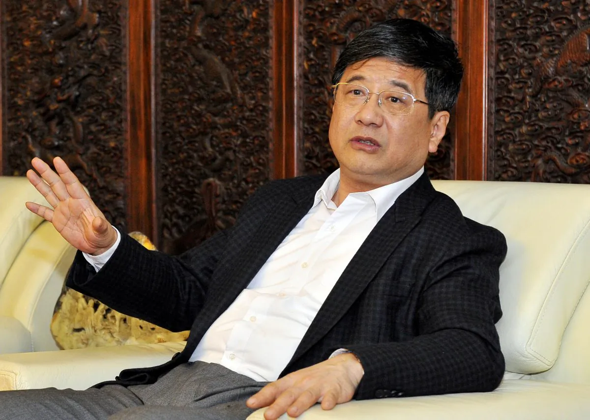 Zheng Xiaosong, head of China's liaison office to Macau, speaks at a meeting in Fuzhou City, Fujian Province, China, on April 23, 2016. (Reuters/Stringer)
