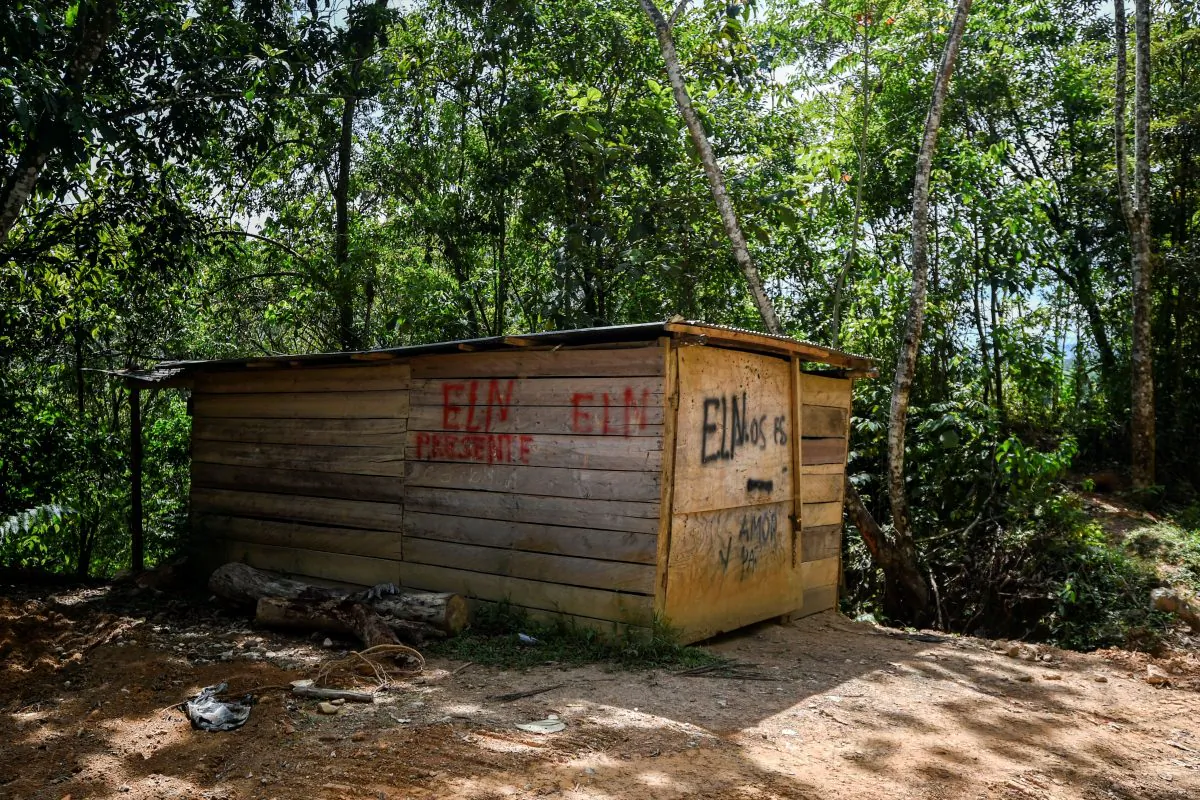 A house painted with the initials of the leftist Colombian guerrilla National Liberation Army (ELN) is seen in the Catatumbo jungle in Colombia on Sept. 20. (Luis Robayo/AFP/Getty Images)