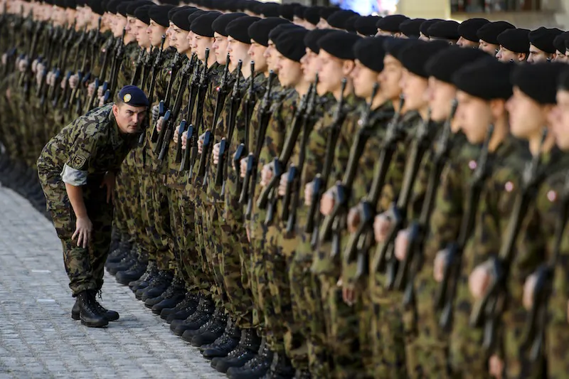 An officer checks the line of the Swiss honor guard prior to the arrival of Italian President Giorgio Napolitano on May 20, 2014 in Bern. (Fabrice Coffrini/AFP/Getty Images)