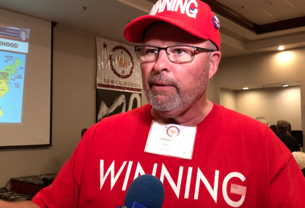 Dan Senser, wearing a "WINNING" shirt