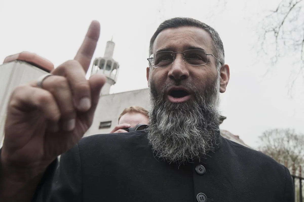 Anjem Choudary speaks during a rally calling for muslims to refrain from voting in the 2015 general election during outside the Regents Park mosque in London. (Niklas Halle'n/AFP/Getty Images)
