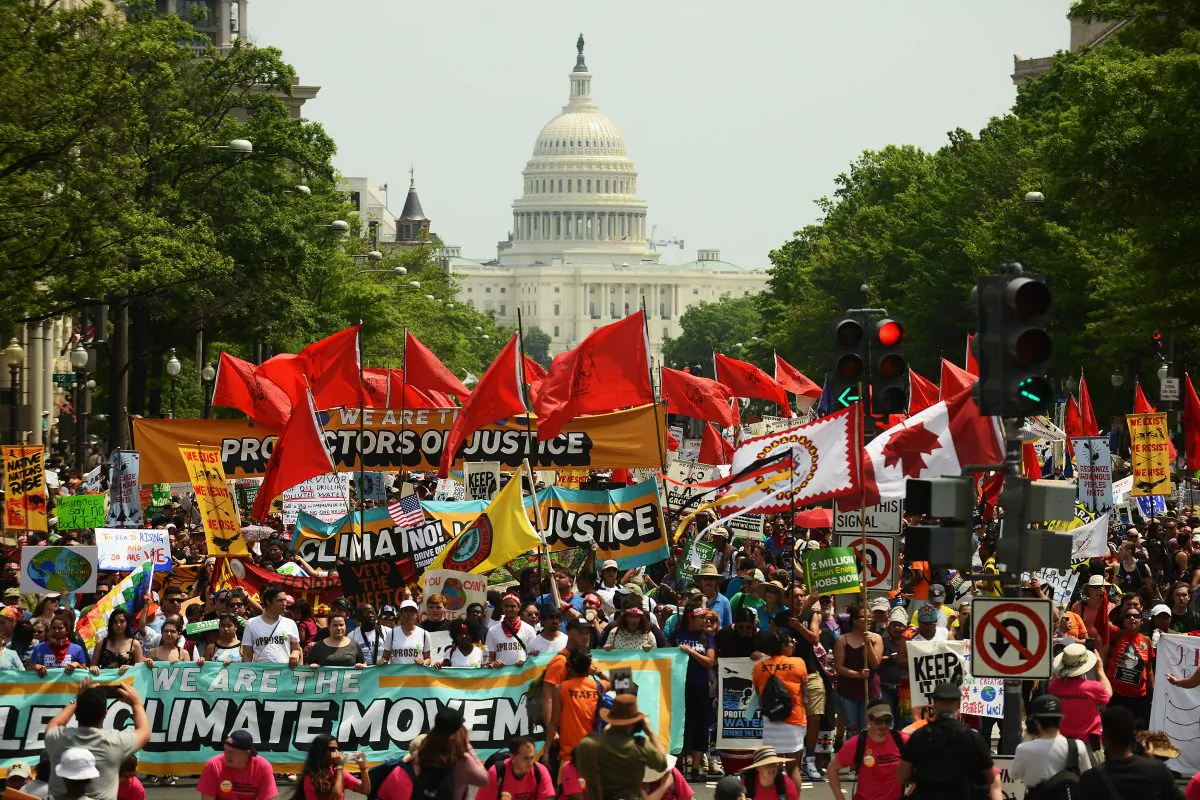 People march to protest President Donald Trump's environmental policies in Washington on April 29, 2017. Many environmentalists don’t accept dissenting opinions and employ fascist tactics to reach their goals.  (Astrid Riecken/Getty Images)