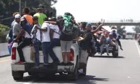 Migrant Caravan Adds Thousands as Hondurans Burn American Flags and Trump Cuts Aid