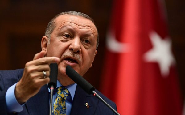 Turkish President Recep Tayyip Erdogan speaks about the murder of Jamal Khashoggi during his weekly parliamentary address in Ankara, Turkey
