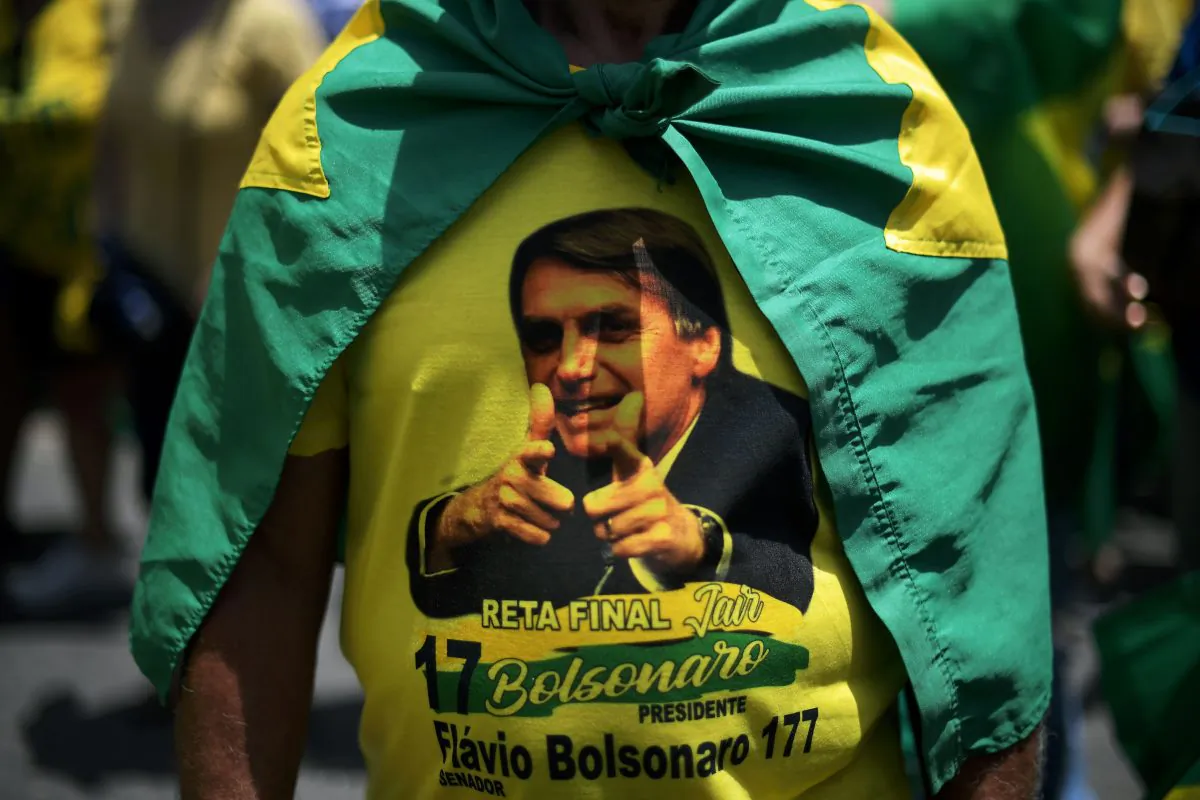 Supporters of Brazil's presidential conservative candidate Jair Bolsonaro take part in a rally in Copacabana, Rio de Janeiro, on Oct. 21, 2018. Barring any last-minute upset, Brazil appears poised to elect Bolsonaro as its next president. (CARL DE SOUZA/AFP/Getty Images)