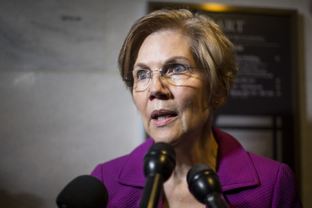 Sen. Elizabeth Warren (D-Mass.) speaks to members of the press during a demonstration against Supreme Court Nominee Brett Kavanaugh in the Hart Senate Office Building on Sept. 27, 2018. (Zach Gibson/Getty Images)