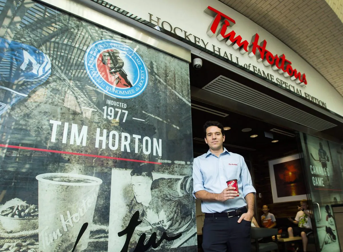 Alex Macedo, president at Tim Hortons poses for a photograph at the Hockey Hall of Fame Tim Hortons location in Toronto on Aug. 16, 2018. (The Canadian Press/Nathan Denette)
