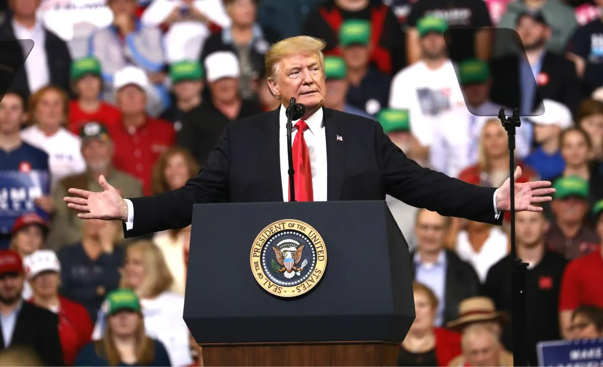 Description: President Donald Trump at a Make America Great Again rally in Council Bluffs, Iowa, on Oct. 9, 2018. (Charlotte Cuthbertson/The Epoch Times)