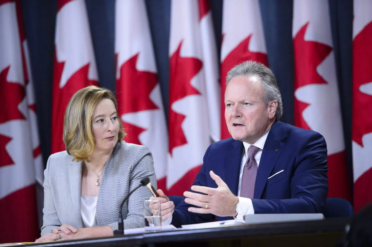 Bank of Canada Senior Deputy Governor Carolyn A. Wilkins and Governor Stephen Poloz hold a press conference in Ottawa on Oct. 24, 2018. Canada’s central bank raised its overnight rate target to 1.75 percent. (The Canadian Press/Sean Kilpatrick)