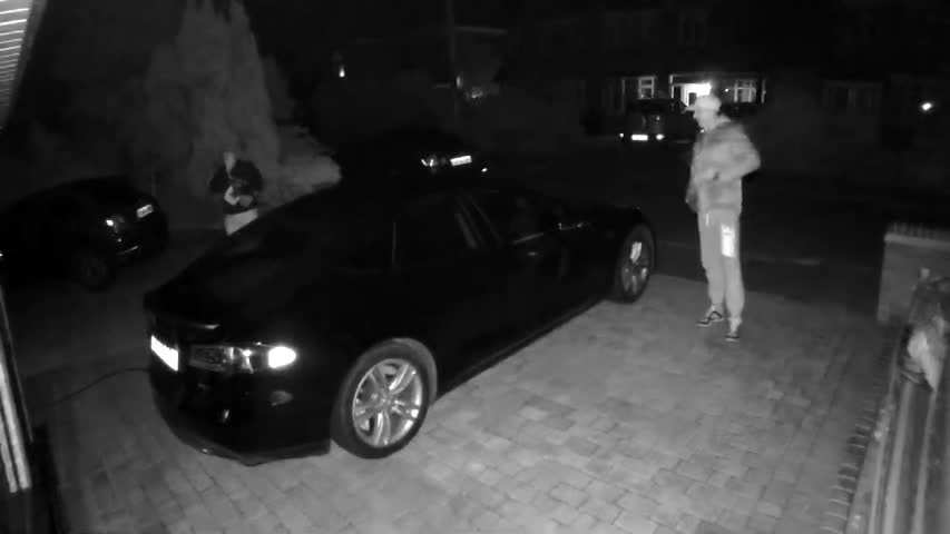 two men caught on video stealing tesla model s