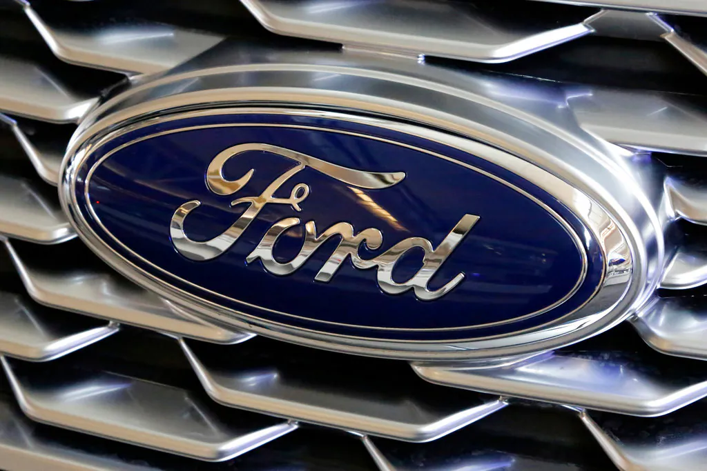 A Ford logo on the grill of a car on display at the Pittsburgh Auto Show on Feb. 15, 2018. (Gene J. Puskar/AP)