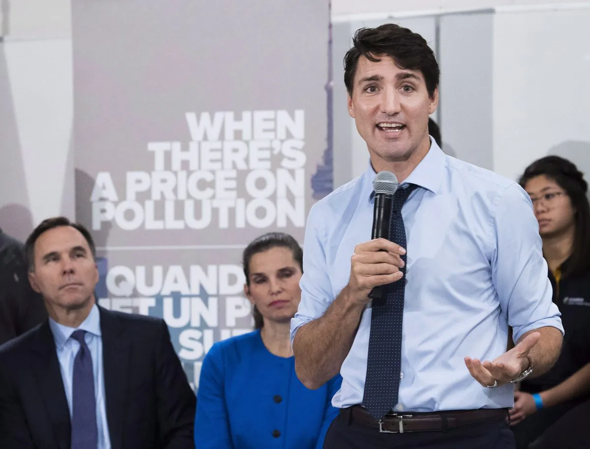 Prime Minister Justin Trudeau speaks to the media and students regarding his government's new federally imposed carbon tax at Humber College in Toronto on Oct. 23, 2018. (The Canadian Press/Nathan Denette)