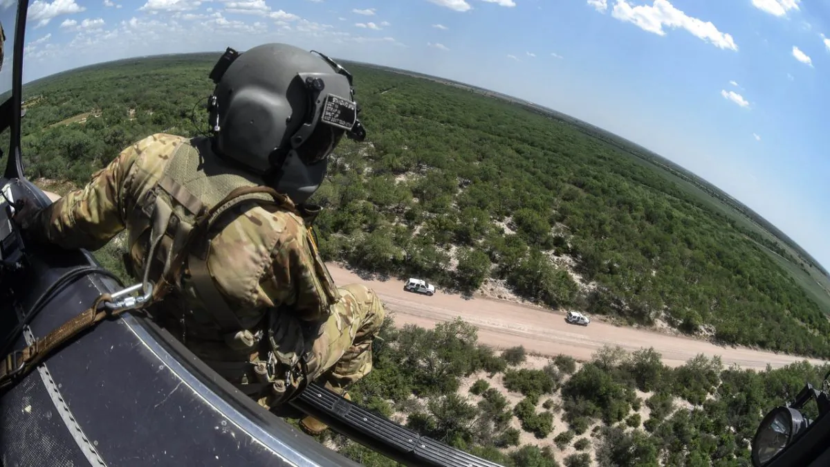 Army National Guard soldiers provide airborne support to the U.S. Department of Homeland Security (DHS) during Operation Guardian Support in proximity of the southwest border in McAllen, Rio Grande valley, Tex., in July 2018. (U.S. Army National Guard/Staff Sgt. Roberto Di Giovine)