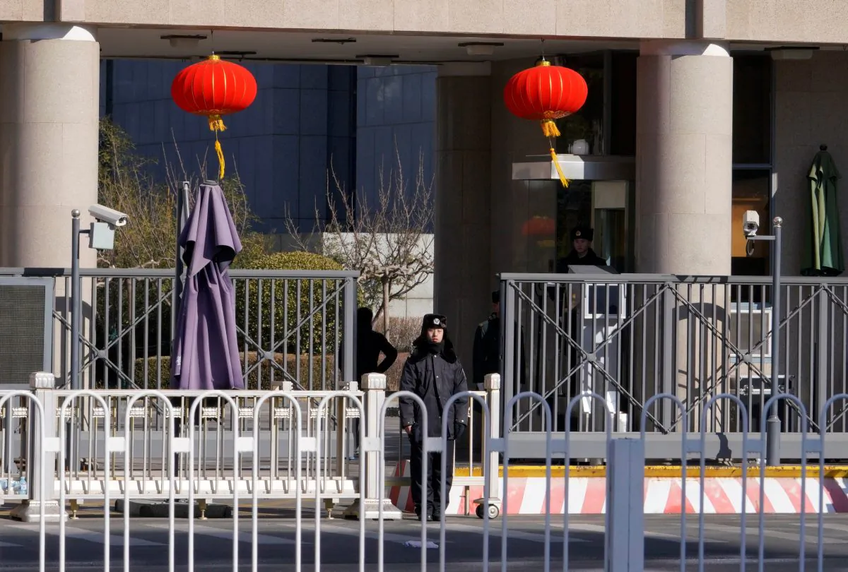 Security personnel stand guard at the headquarters of the Central Commission for Discipline Inspection in Beijing on Feb. 10, 2018. (Jason Lee/Reuters)