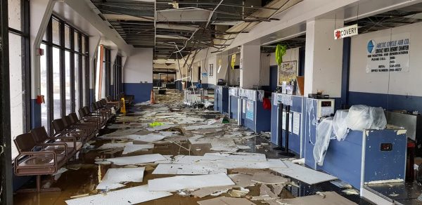 Ceiling panels debris cover ground