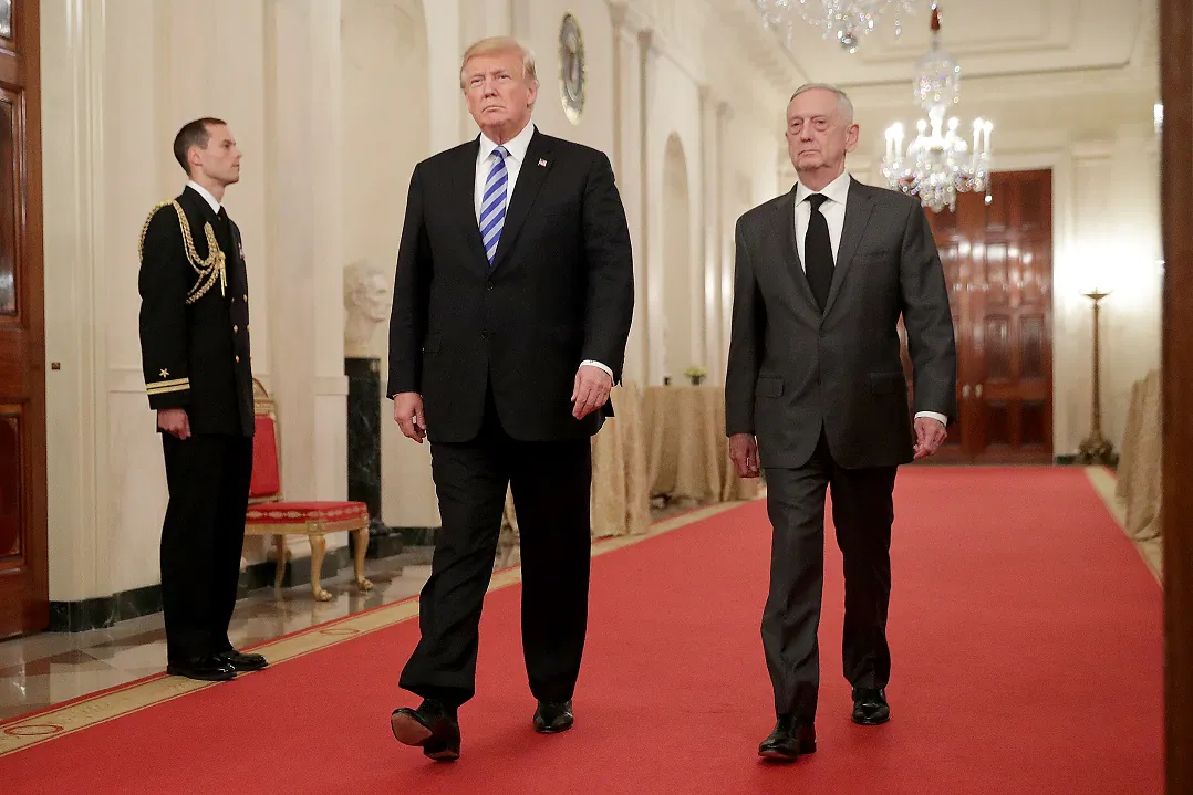 Former Defense Secretary and retired four-star Marine Corps Gen. James Mattis, here in the White House in 2018 with former President Donald Trump, was a military adviser for United Arab Emirates in 2015-16. (Chip Somodevilla/Getty Images)