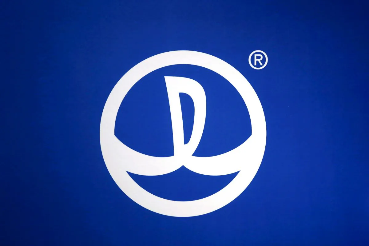 The logo of the Dalian Wanda Commercial Properties is seen at a news conference in Hong Kong on March 31, 2015. (Tyrone Siu/Reuters)