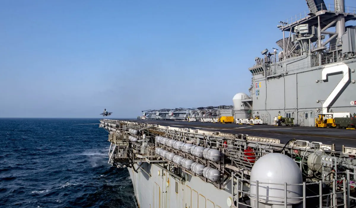 An F-35B Lightning II launches from the flight deck of amphibious assault ship USS Essex for the F-35B's first combat strike on Sept. 27, 2018. (U.S. Navy photo by Mass Communication Specialist 3rd Class Matthew Freeman)