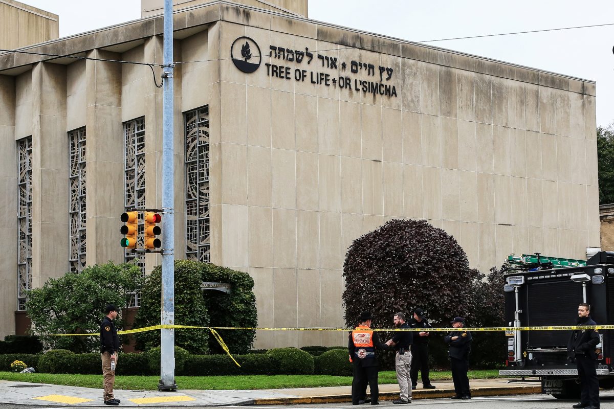 Police officers guard the Tree of Life synagogue following shooting at the synagogue in Pittsburgh Pennsylvania