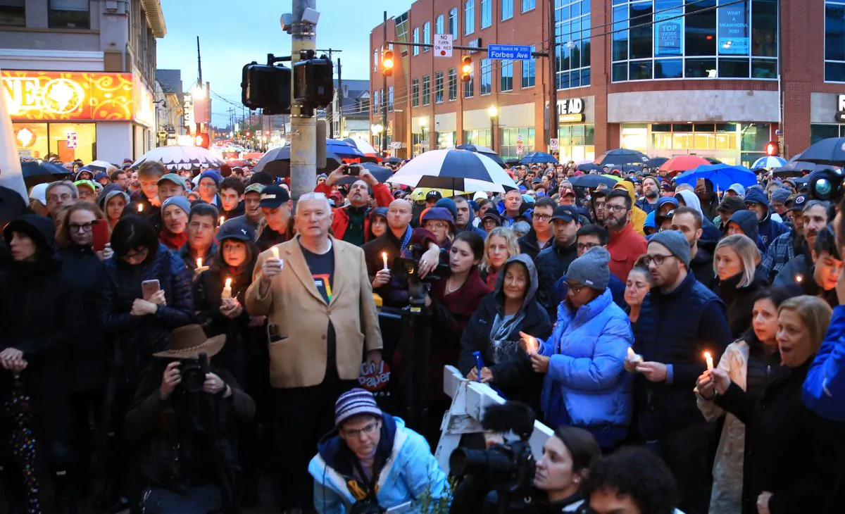 People gathered to mourn the loss of life as they hold a vigil for the victims of Pittsburgh synagogue shooting in Pittsburgh, Pennsylvania, U.S., October 27, 2018. REUTERS/John Altdorfer