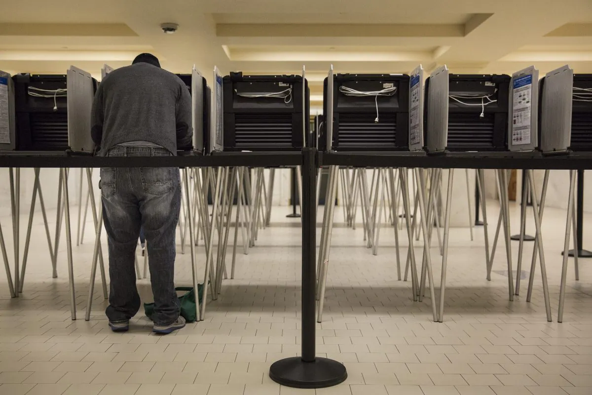 A man votes in the California primary at City Hall in San Francisco on June 7, 2016. (Andrew Burton/Getty Images)