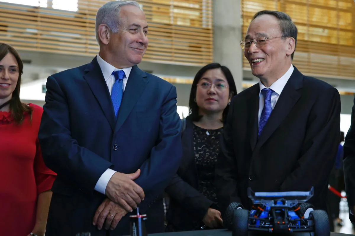Chinese Vice Chair Wang Qishan (R) during his tour with Israeli Prime Minister Benjamin Netanyahu of the Israeli Innovation Summit in Jerusalem on October 24, 2018. (ARIEL SCHALIT/AFP/Getty Images)