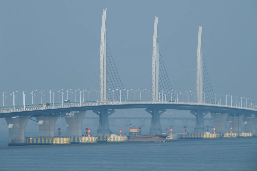 Buses drive on a section of the Hong Kong-Macau-Zhuhai Bridge on Oct. 24, 2018. (Anthony Wallace/AFP/Getty Images)
