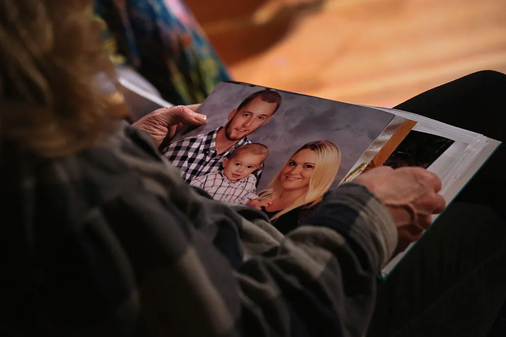 Kim Sullivan, who's son (in photo), died of a heroin overdose, prepares to address students at Fitch Senior High School to educate teens about the dangers of opioid painkiller medication and heroin addiction on Feb. 26, 2016 in Groton, Conn. (John Moore/Getty Images)