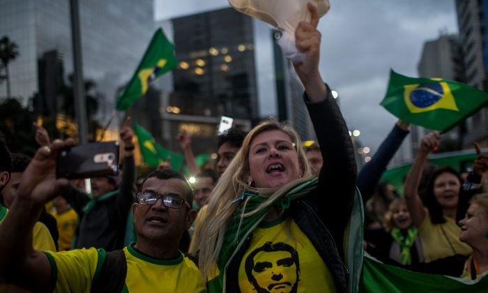 Supporters of Jair Bolsonaro celebrate victory in the presidential elections on Oct. 28, 2018, in Sao Paulo, Brazil. (Victor Moriyama/Getty Images)