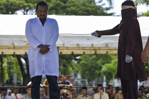 man is caned for close proximity