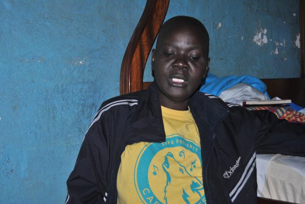 Caroline Achieng', a breast cancer patient living in Kariobangi slums in Nairobi.