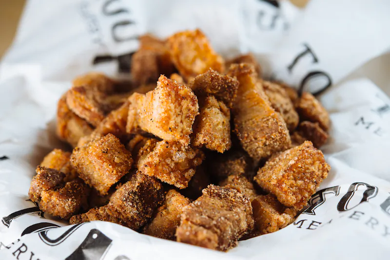 Cracklins, deep-fried chunks of pork belly and skin, are a boucherie staple. (Courtesy of Toups South)