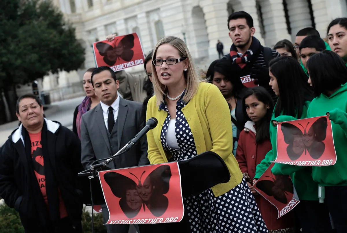 Rep. Kyrsten Sinema (D-AZ) speaks at a press conference held by the Dream Action Coalition on immigration reform in Washington, on Dec. 4, 2013. (Win McNamee/Getty Images)