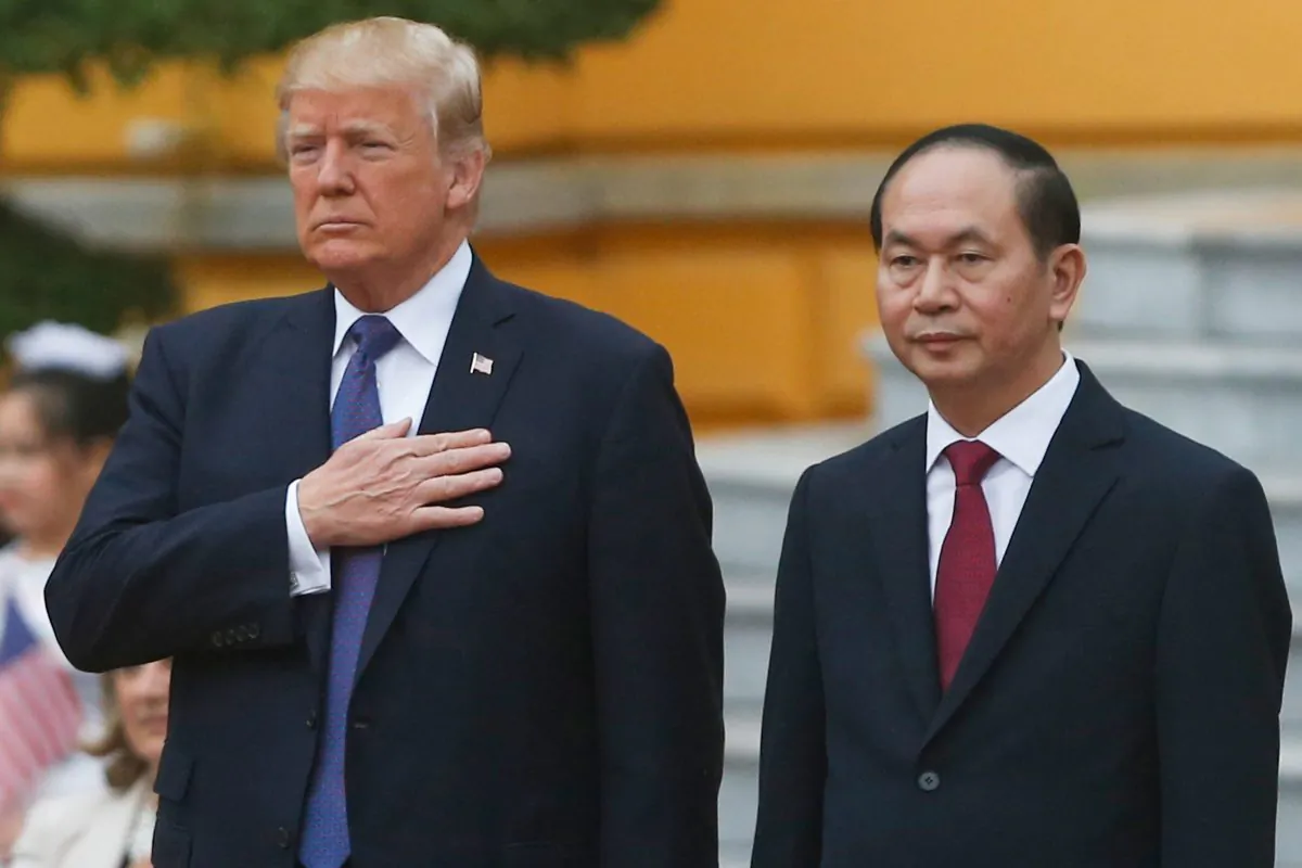 U.S. President Donald Trump (L) and Vietnam's President Tran Dai Quang attend a welcoming ceremony at the Presidential Palace in Hanoi on November 12, 2017. (KHAM/AFP/Getty Images)