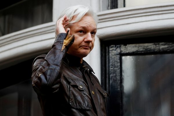 WikiLeaks founder Julian Assange is seen on the balcony of the Ecuadorian Embassy in London
