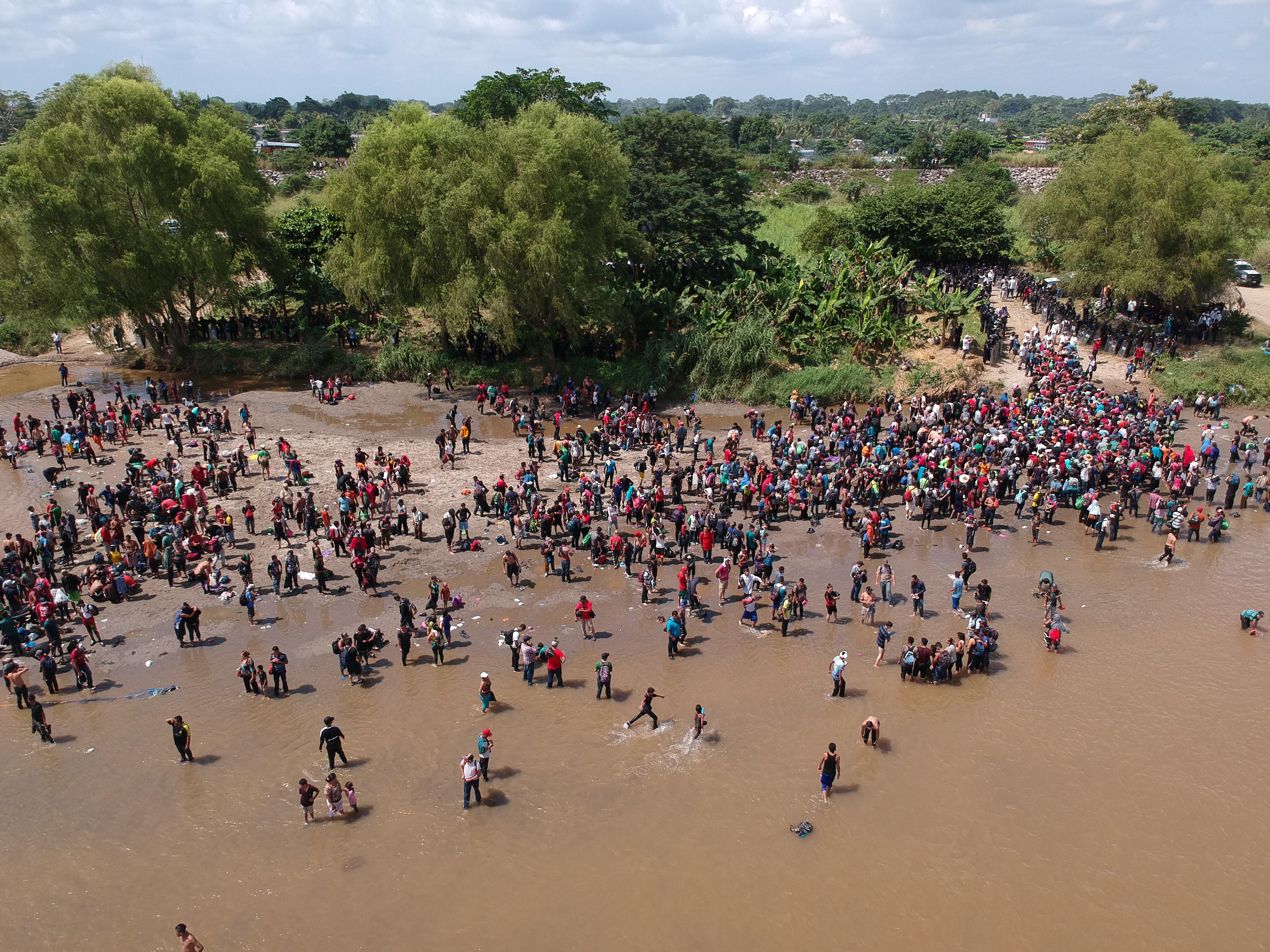 Migrants reaching Mexico after crossing the Suchiate River from Tecun Uman in Guatemala to Ciudad Hidalgo in Mexico