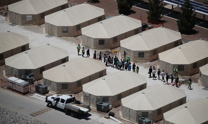 Children and workers on June 19, 2018, at a tent encampment near the Tornillo Port of Entry in Texas. (Joe Raedle/Getty Images)